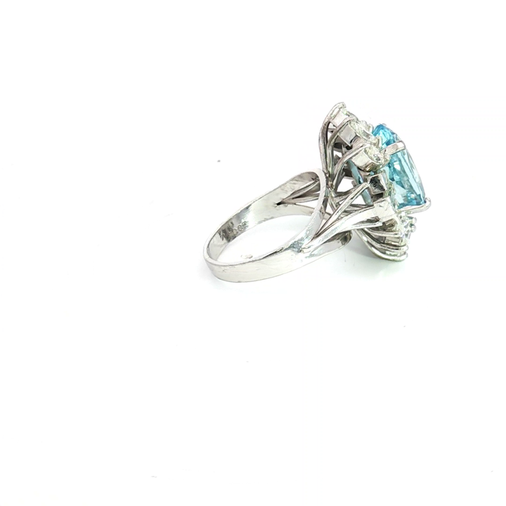 White Gold Cocktail Ring Featuring an Oval Faceted Aquamarine