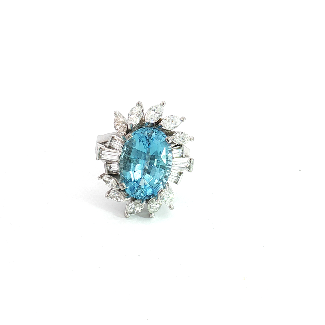 White Gold Cocktail Ring Featuring an Oval Faceted Aquamarine