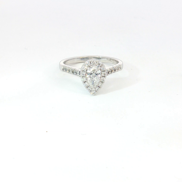 18ct White Gold pear cut diamond and RBC halo Ring.