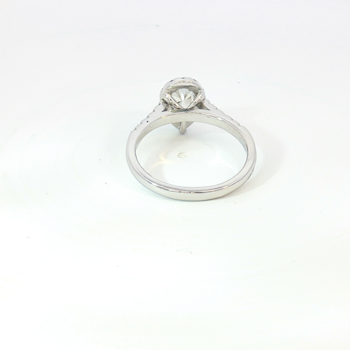 18ct White Gold pear cut diamond and RBC halo Ring.