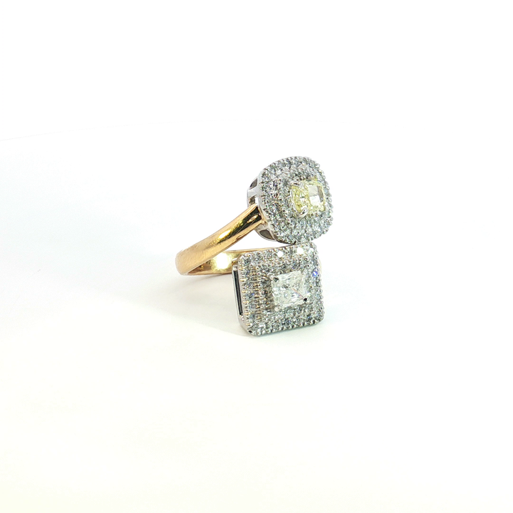18ct yellow and white gold double cluster offset ring with a radiant cut white diamond and cushion cut yellow diamond