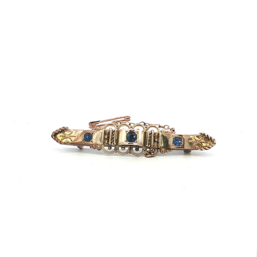 9ct YG Brooch with Sapphire Doublets