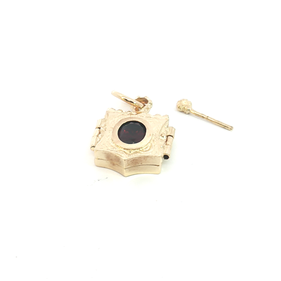9ct YG Locket Pendant with Garnet