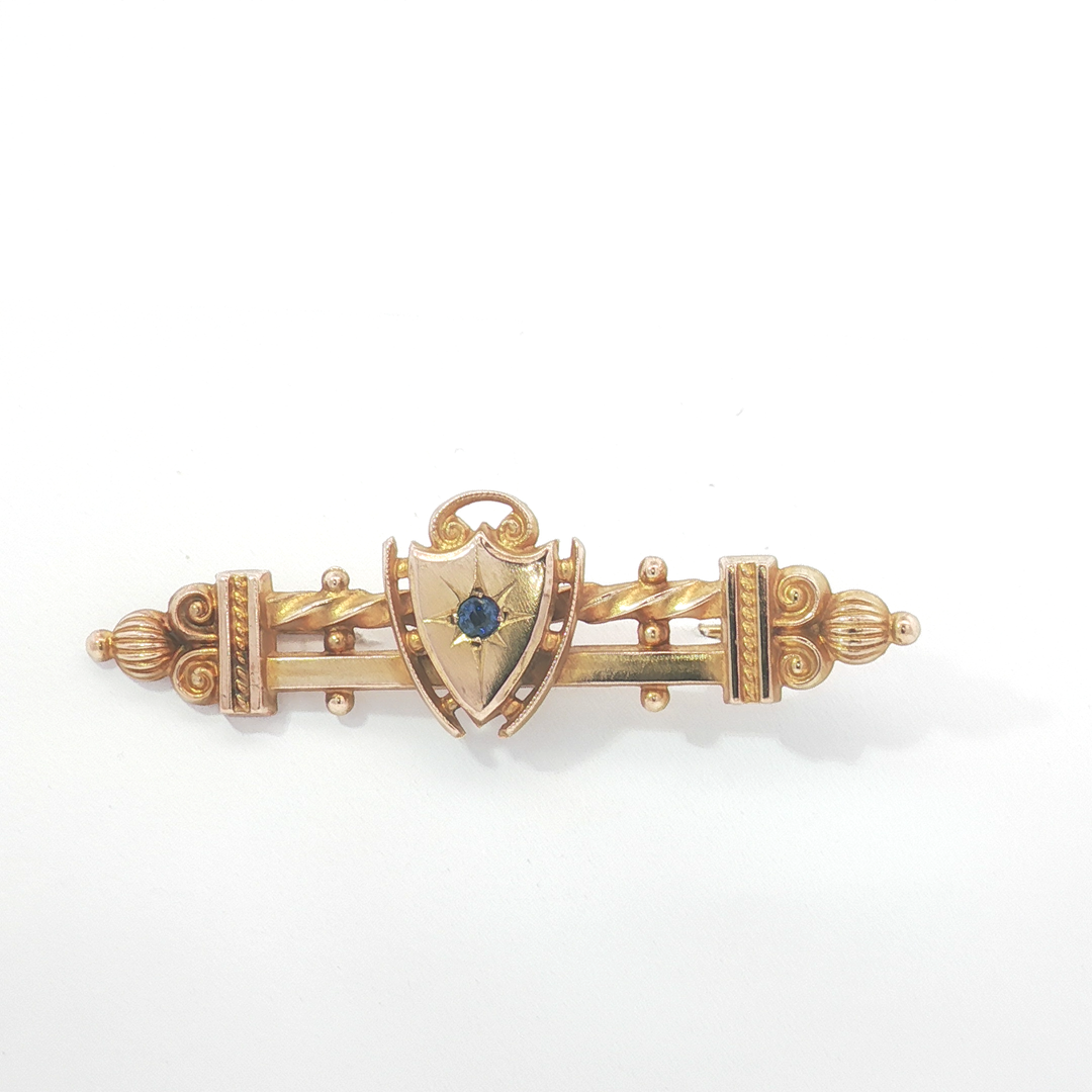 9ct YG Bar Brooch with Sapphire Doublet