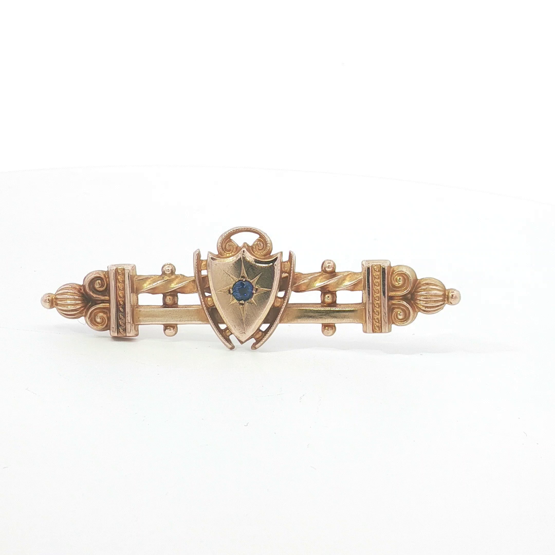 9ct YG Bar Brooch with Sapphire Doublet