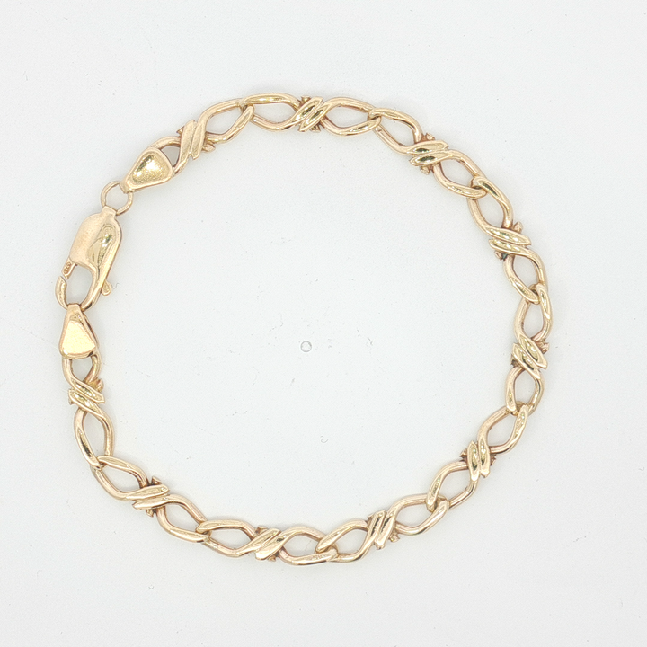 9ct YG Twisted Infinity Link Bracelet