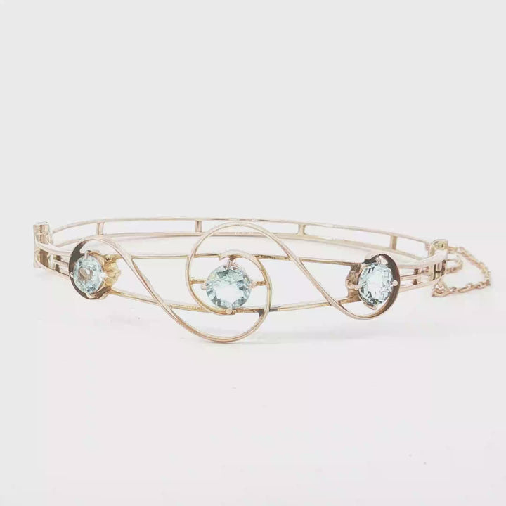 9ct RG 3 Aquamarine Swirl Bangle
