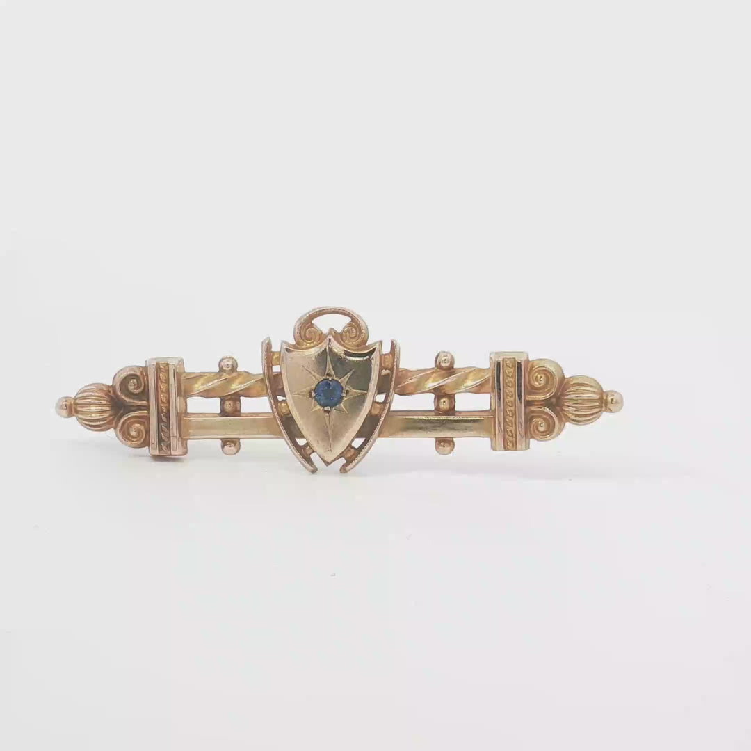 9ct YG Bar Brooch with Sapphire Doublet