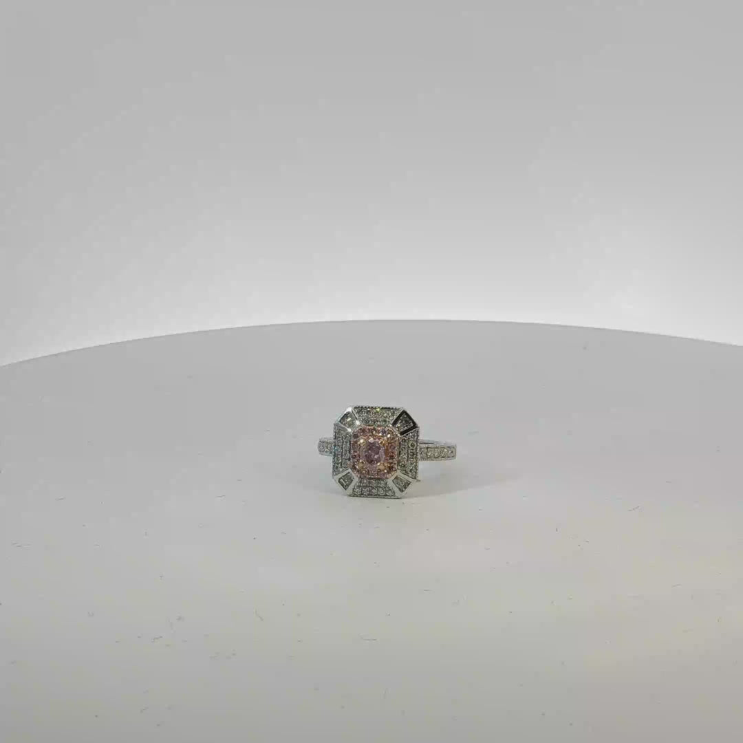 18ct White Gold Ring Featuring Fancy Pink Diamonds.