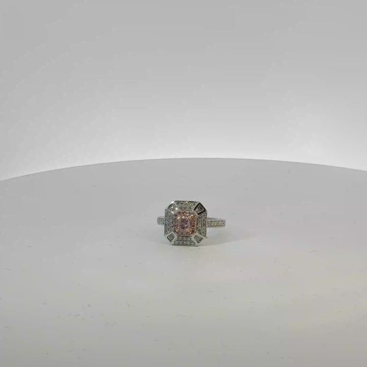 18ct White Gold Ring Featuring Fancy Pink Diamonds.